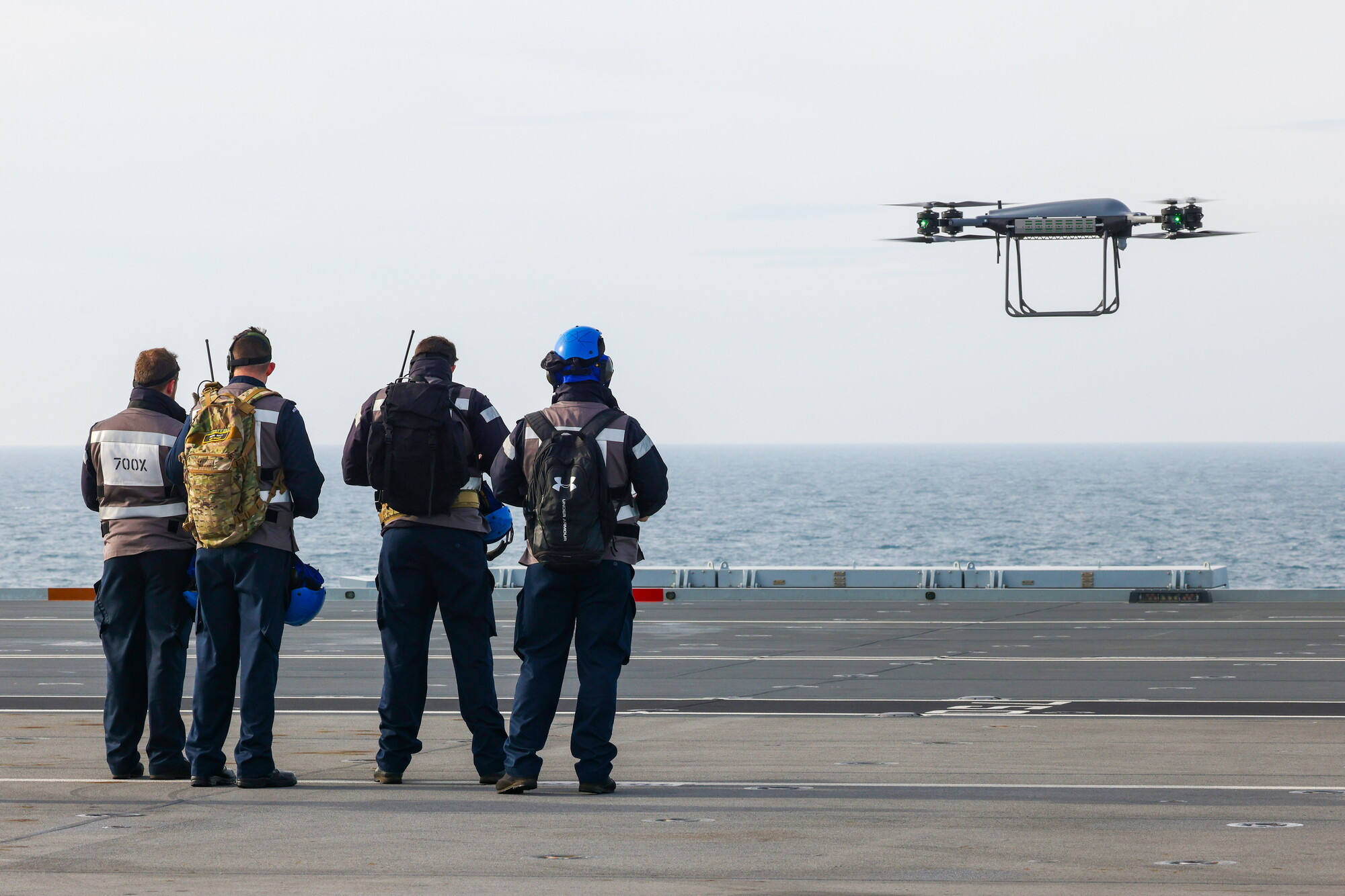 T-150 viewed from a ship with operatives in the foreground